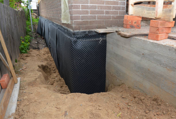 SJ Waterproofing Pros technician performing targeted Crawl Space Encapsulation assessment in Oconto Falls, WI